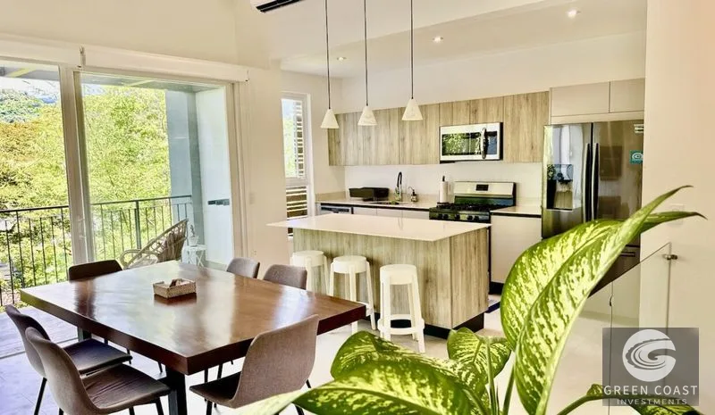 Eco-Chic 2-Bed Townhouse with Ocean Peek & Solar in Gated Hermosa Community — view 1, Garabito, Costa Rica