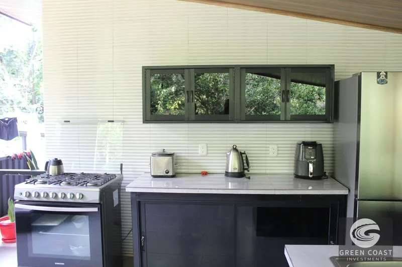 Modern Coastal Retreat Near Ojochal: Expandable 2-Bed Home with Lush Gardens & Room for Pool — view 1, Puerto Cortes, Osa, Costa Rica