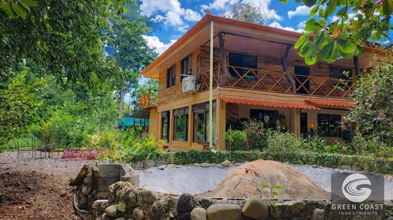 Manuel Antonio Jungle Retreat: Riverfront Wooden Home on 1.4 Acres with Fruit Trees — view 1, Quepos, Costa Rica