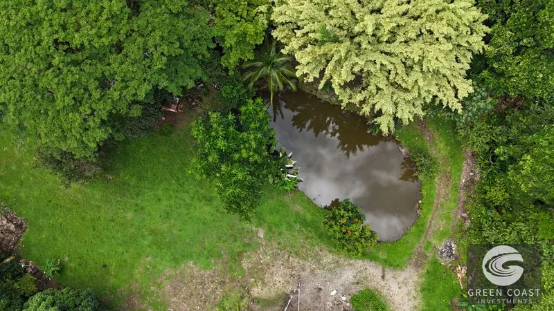4.3-Acre Riverfront Oasis with Pond and Versatile Commercial/Residential Structure in Quepos — view 1, Londres, Quepos, Costa Rica