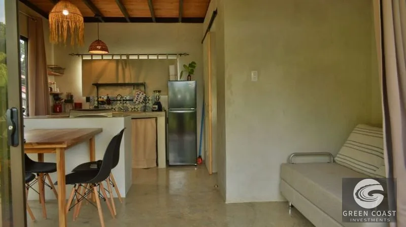 Income-Generating Pavones Duplex: Modern Oasis with Lush Fruit Gardens & Proven Airbnb Revenue — view 1, Pavones, Golfito, Costa Rica