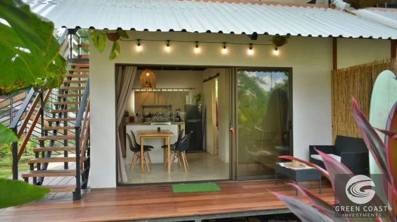 Income-Generating Pavones Duplex: Modern Oasis with Lush Fruit Gardens & Proven Airbnb Revenue — view 2, Pavones, Golfito, Costa Rica