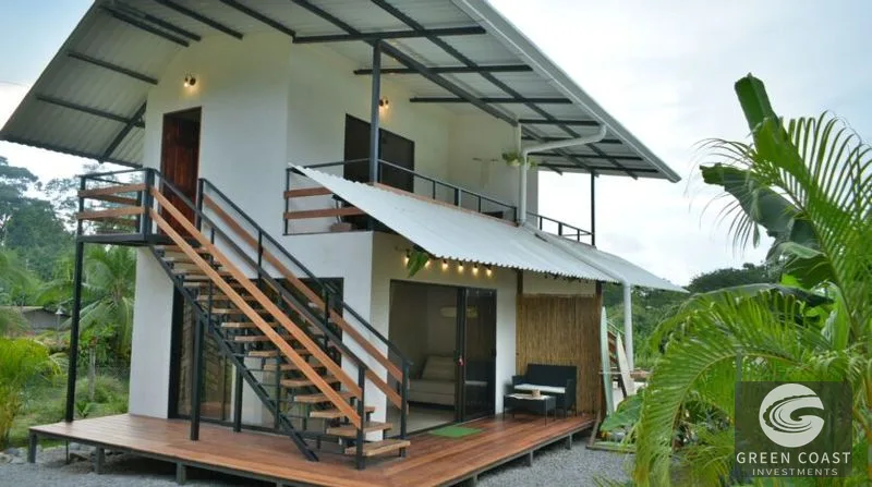 Income-Generating Pavones Duplex: Modern Oasis with Lush Fruit Gardens & Proven Airbnb Revenue — view 4, Pavones, Golfito, Costa Rica