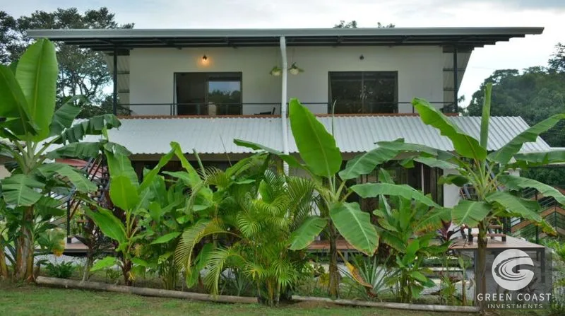 Income-Generating Pavones Duplex: Modern Oasis with Lush Fruit Gardens & Proven Airbnb Revenue — view 5, Pavones, Golfito, Costa Rica