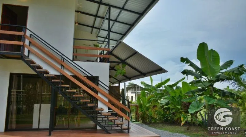 Income-Generating Pavones Duplex: Modern Oasis with Lush Fruit Gardens & Proven Airbnb Revenue — view 6, Pavones, Golfito, Costa Rica