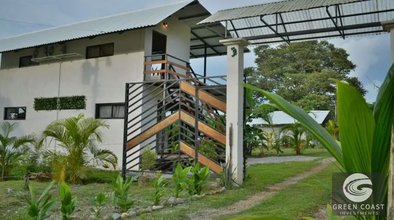 Income-Generating Pavones Duplex: Modern Oasis with Lush Fruit Gardens & Proven Airbnb Revenue — view 7, Pavones, Golfito, Costa Rica
