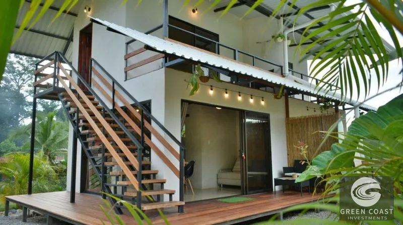 Income-Generating Pavones Duplex: Modern Oasis with Lush Fruit Gardens & Proven Airbnb Revenue — view 8, Pavones, Golfito, Costa Rica