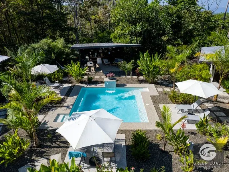 Income-Producing Boutique Hotel Compound with Private Residence and Prime Highway Frontage in Uvita — view 1, Uvita, Costa Rica